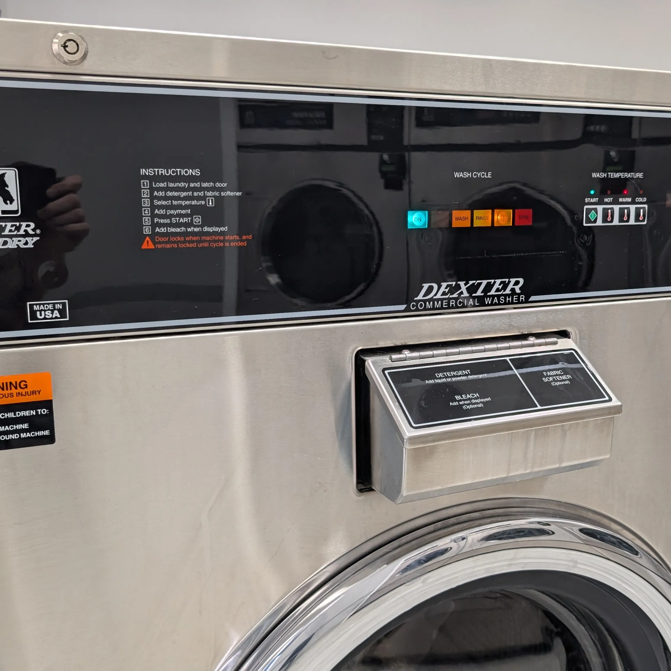 Control panel and detergent dispenser on a Dexter commercial washer