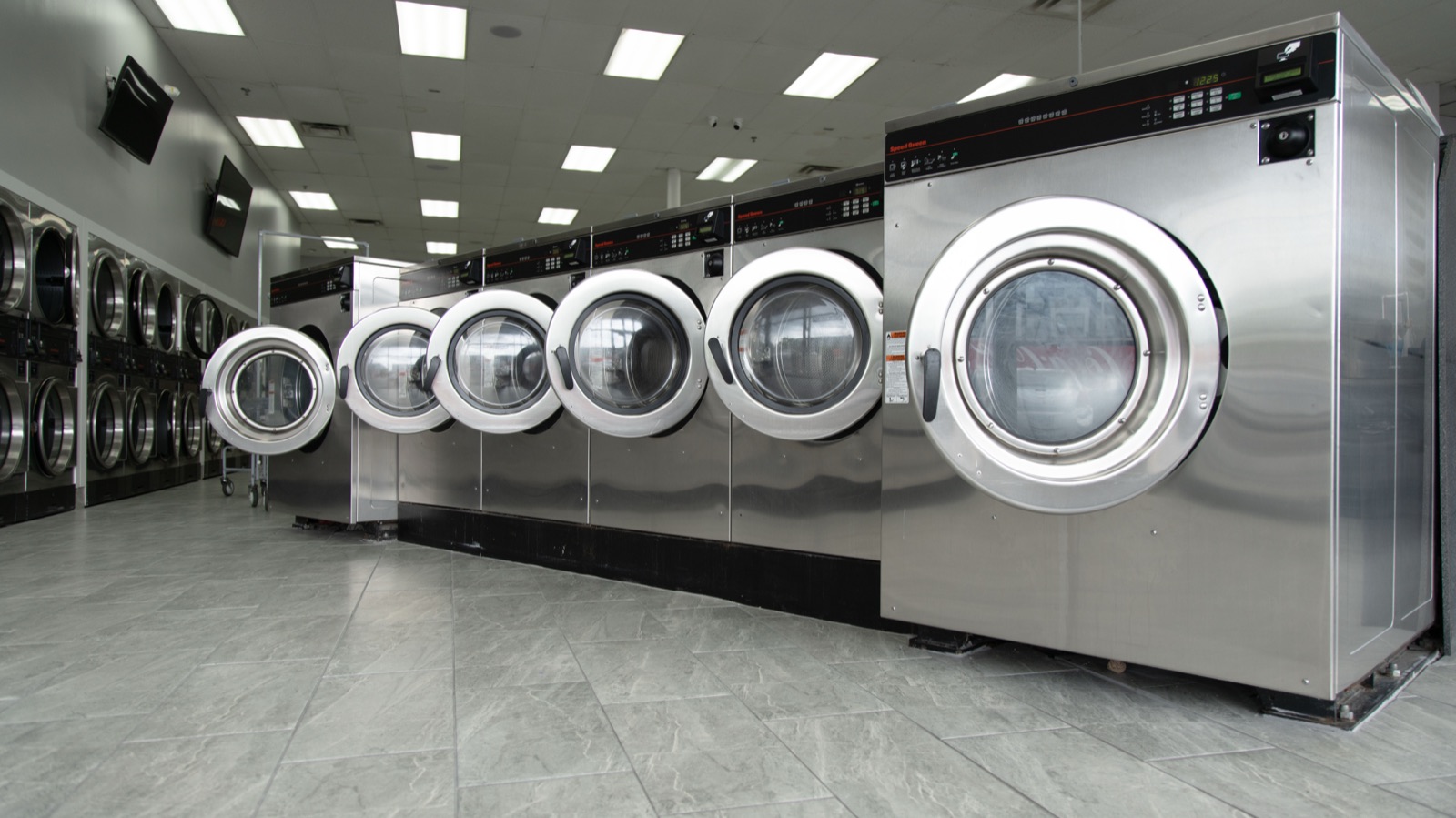 Row of large-capacity commercial washers