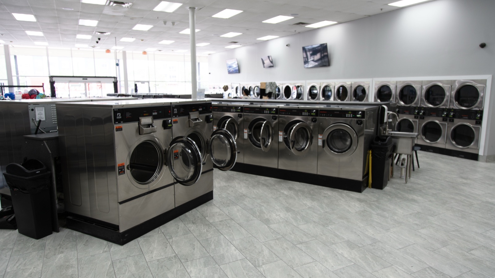 Rows of commercial washers and dryers at our Detroit facility