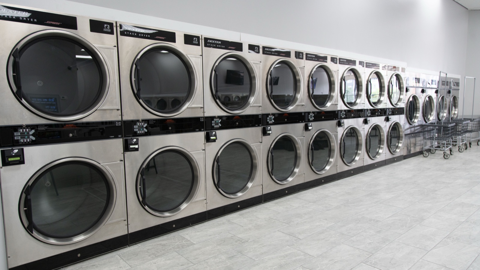 Wall of stacked commercial dryers