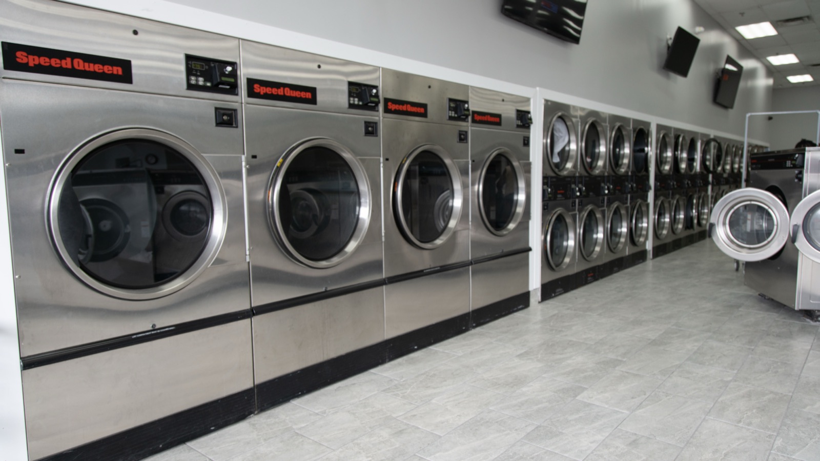Commercial dryers lining the wall of our Detroit facility