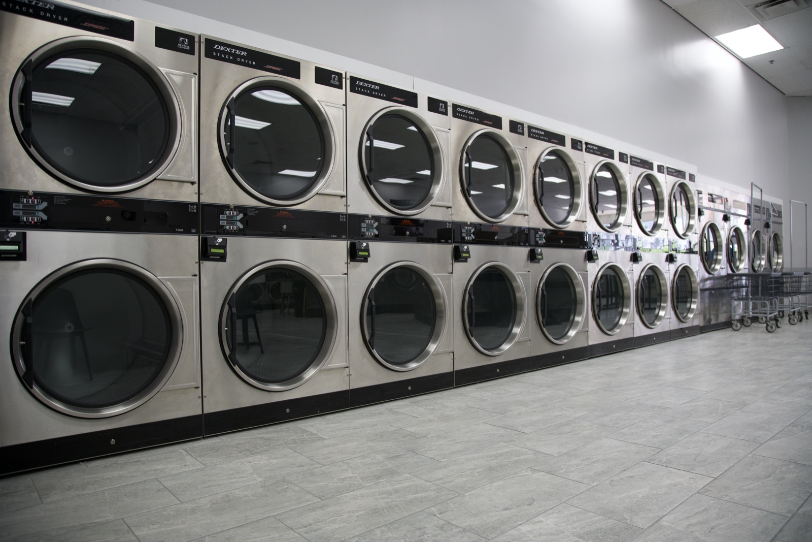 Close view of stacked commercial dryers