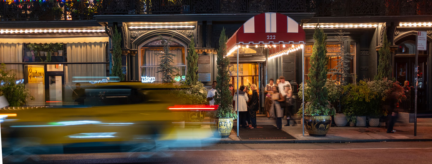 People waiting under awning