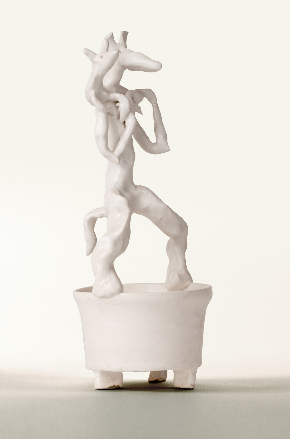 Porcelain sculpture of imaginary animal by artist Gerda van Leeuwen.