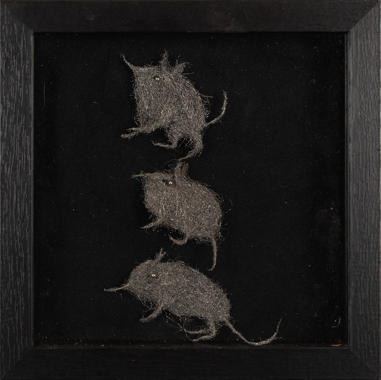 mixed media image of three animals made from steel wool in shadow box by artist Gerda van Leeuwen