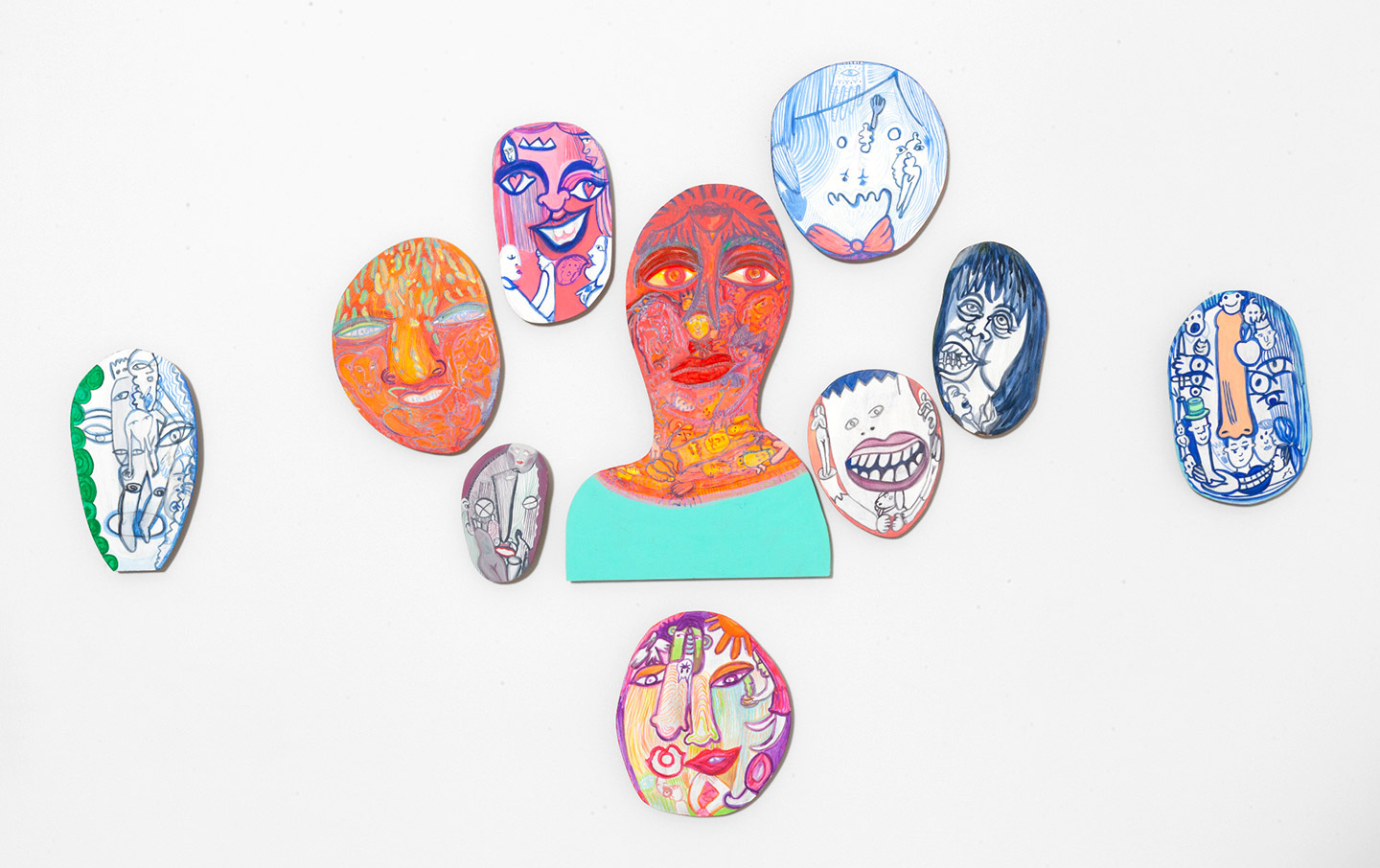 Images of human heads by artist, Zena Gurbo.