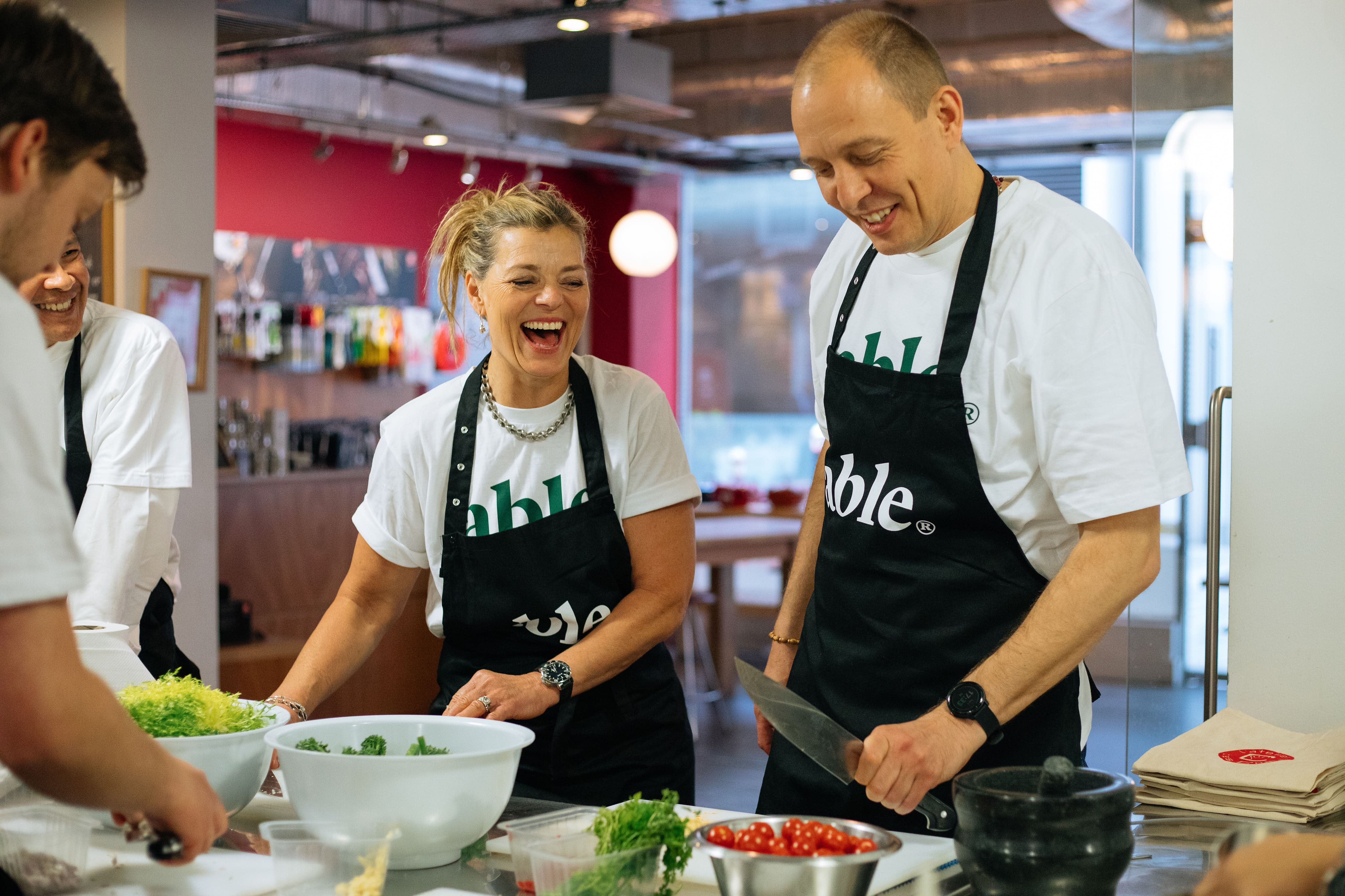 Three people cooking