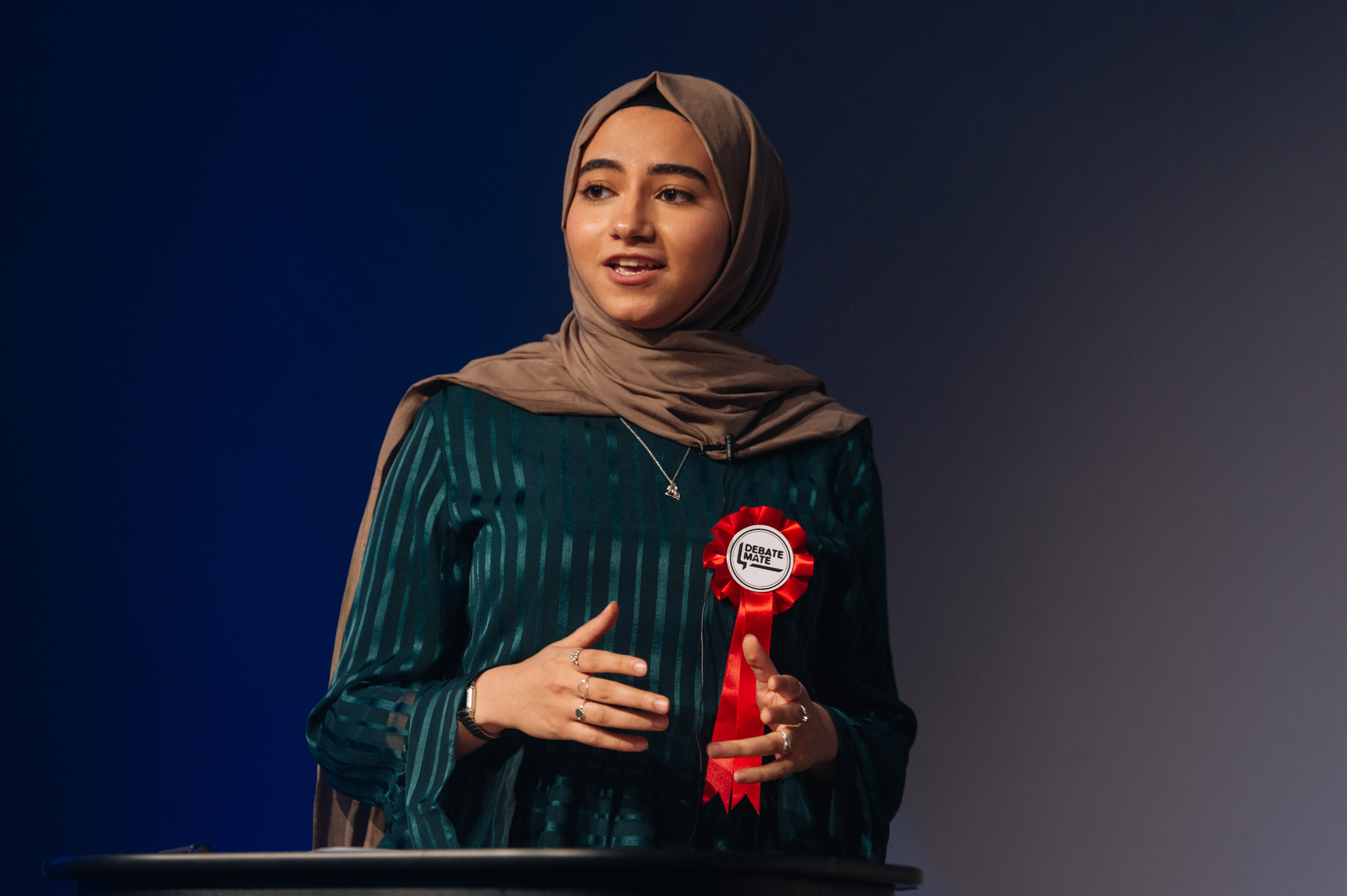 A female speaker at an awards session