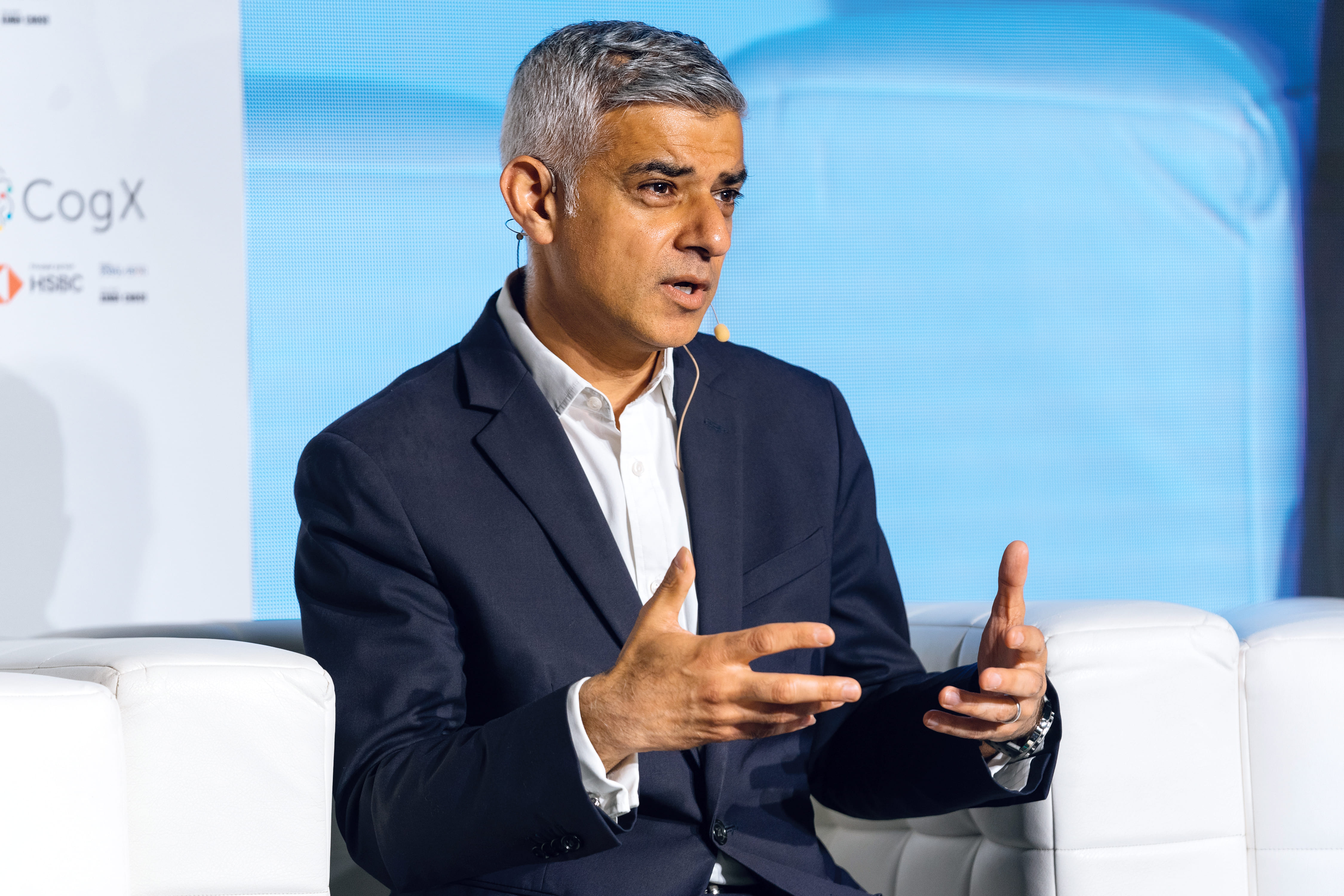 Speaker participating in a panel discussion at the CogX event, sharing insights on innovation and technology