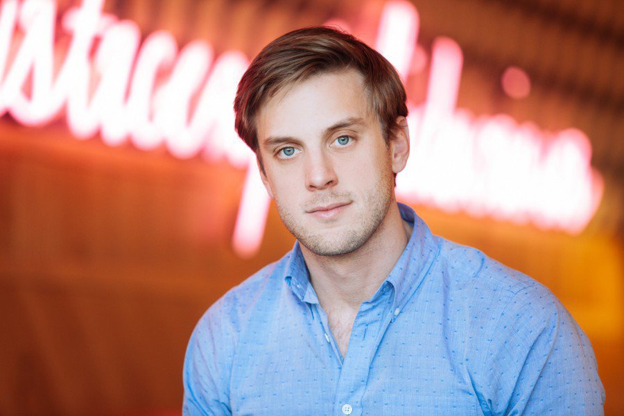 Casual male headshot with relaxed expression and natural lighting