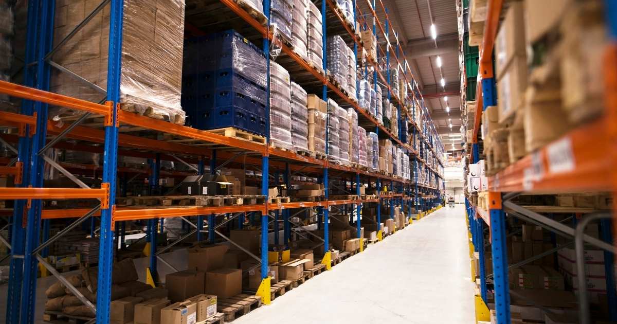 warehouse aisle with product on shelving units