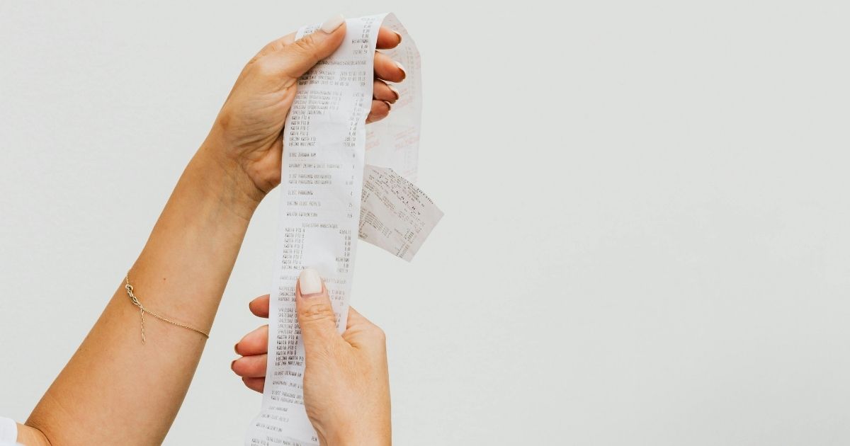 a consumer reviewing a receipt