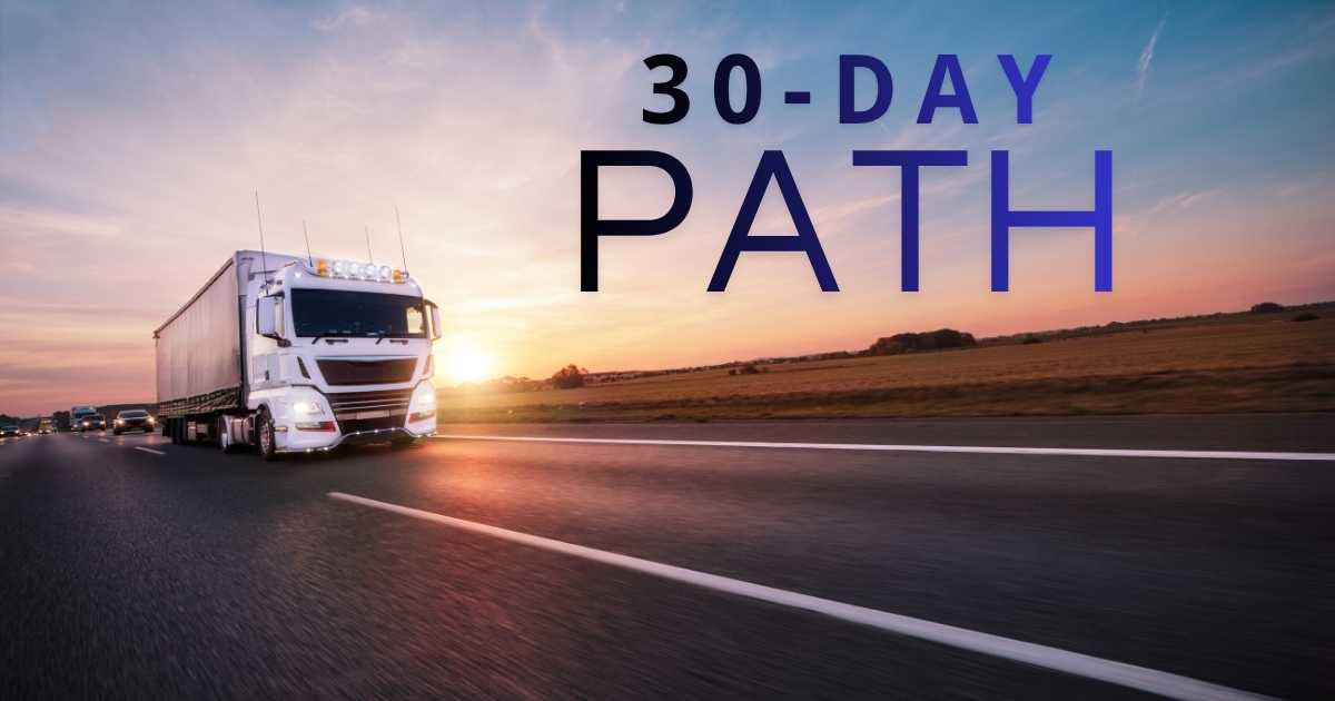 a truck driving down the road with the words 30-day path