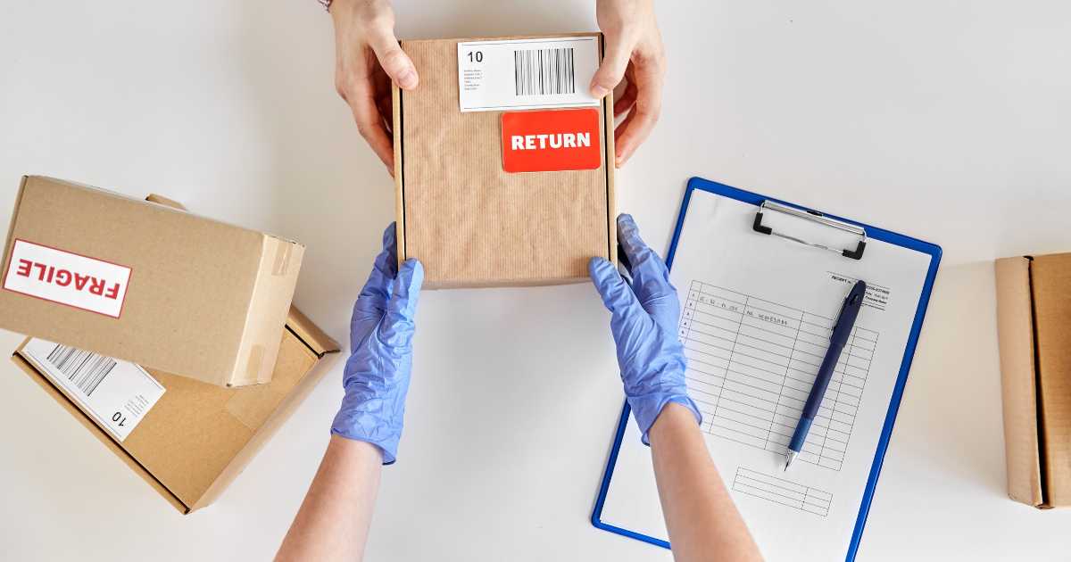 a consumer handing a return package to an employee