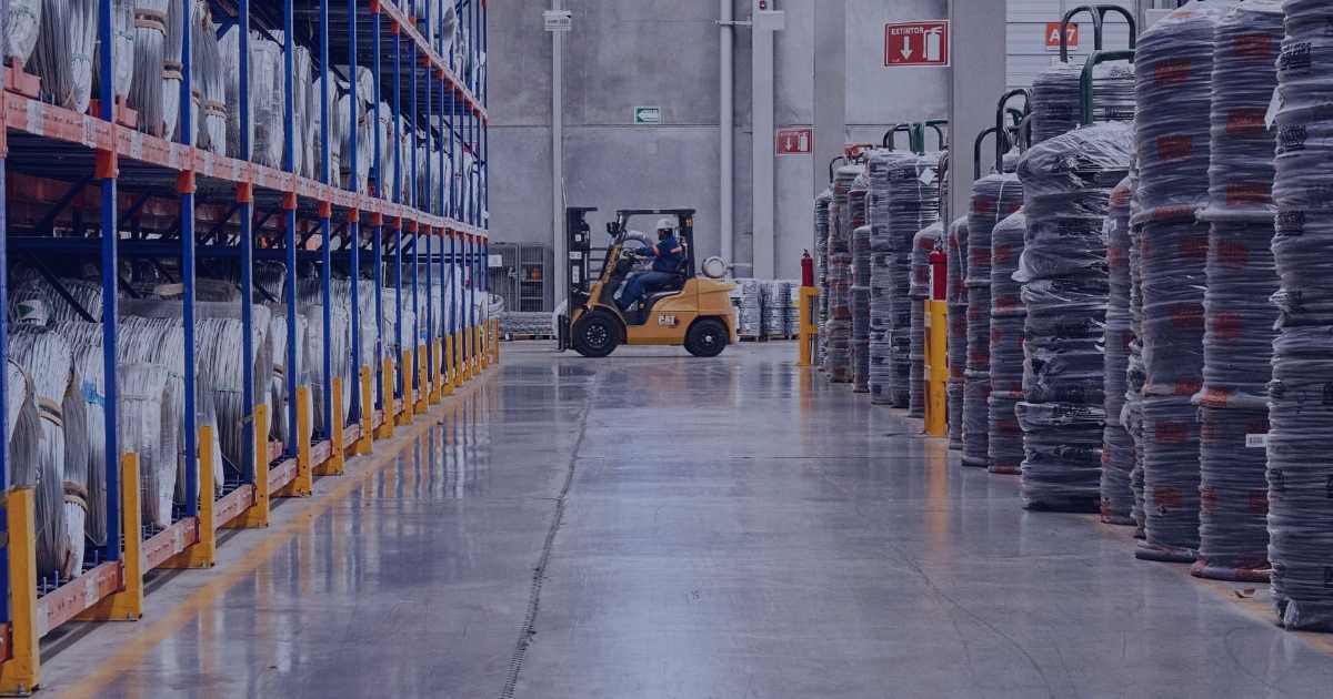 A forklift driver in a warehouse