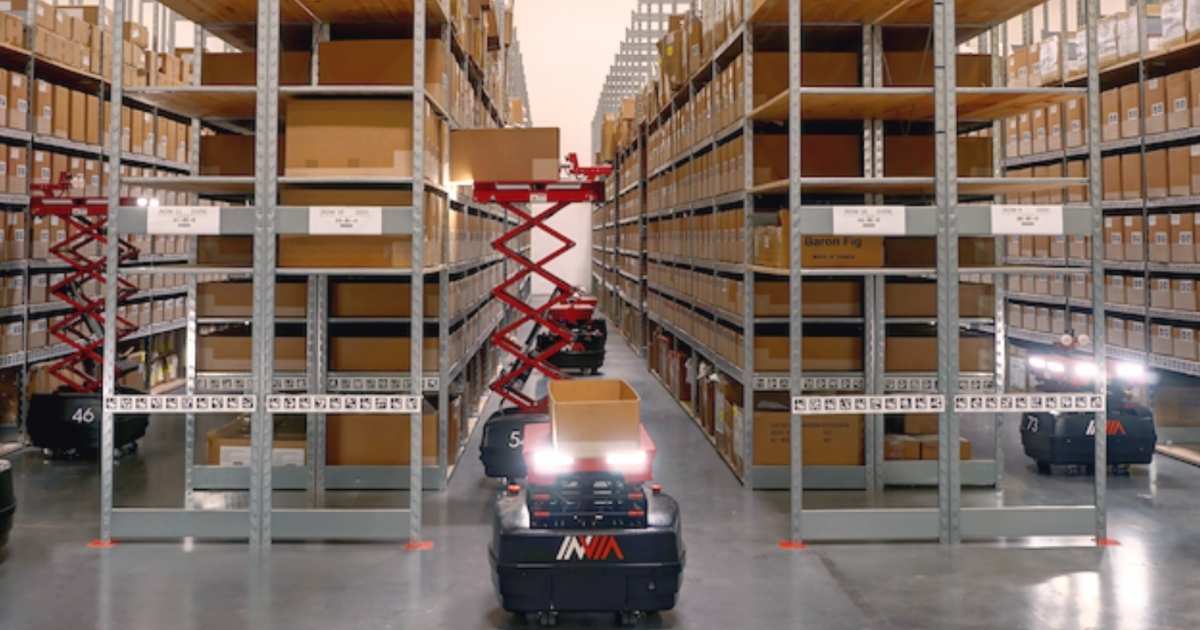 A picture of InVia AMRs working in an a2b Fulfillment facility.