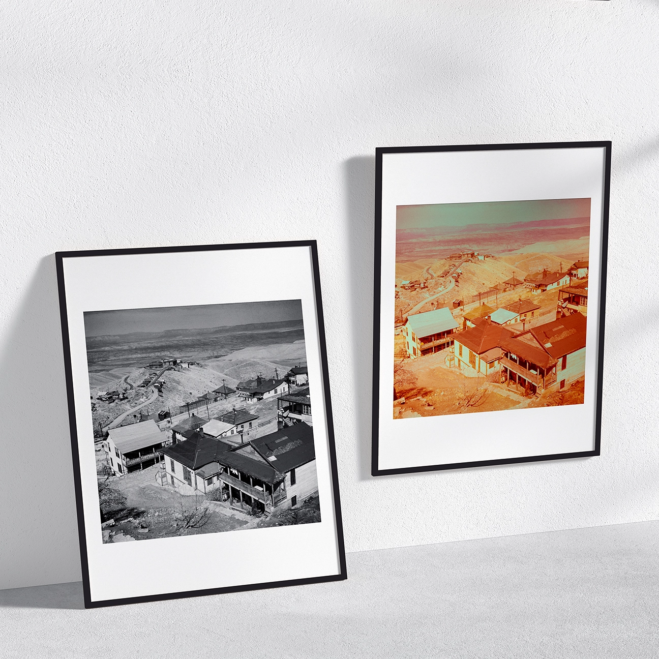 Jerome, Arizona desert hillside town print displayed side-by-side in black-and-white and color framed editions.