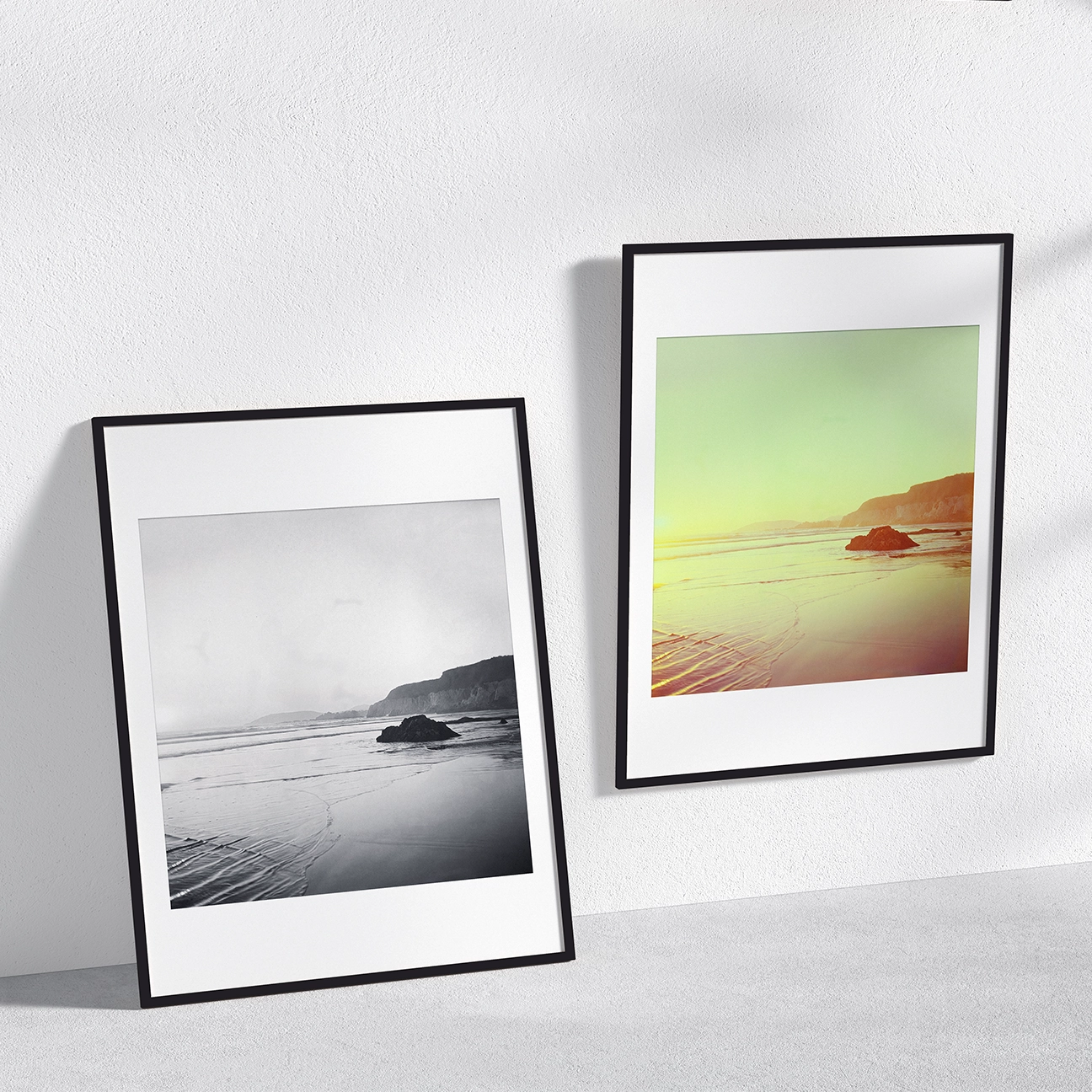Two framed prints shown together—black-and-white and color versions of a Pismo Beach sunrise in a minimalist wall mockup.