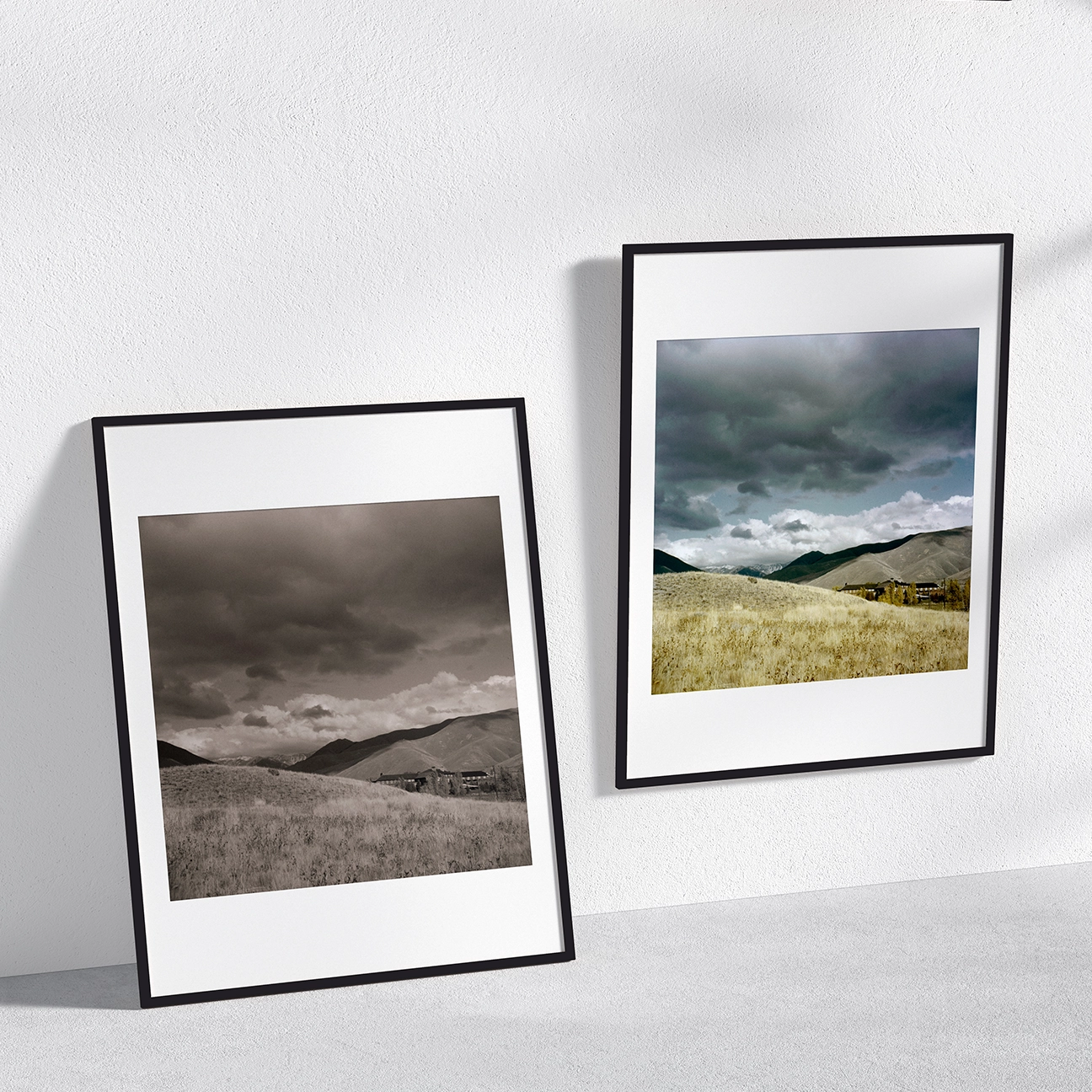 Two framed versions of “Sun Valley 86T, Idaho” on a textured wall—one sepia, one color.