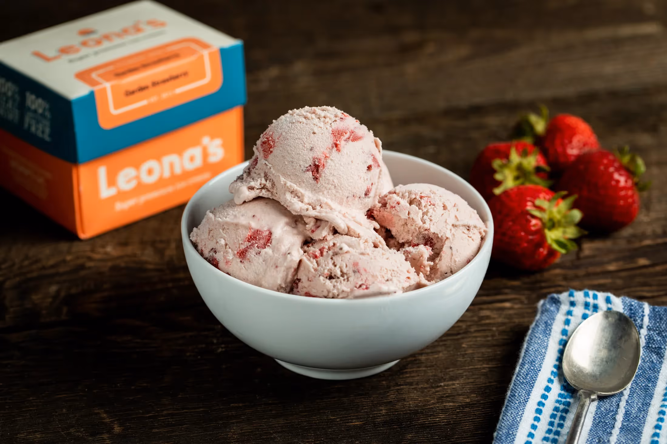 Leona's Ice Cream in a bowl with the pint carton in the background