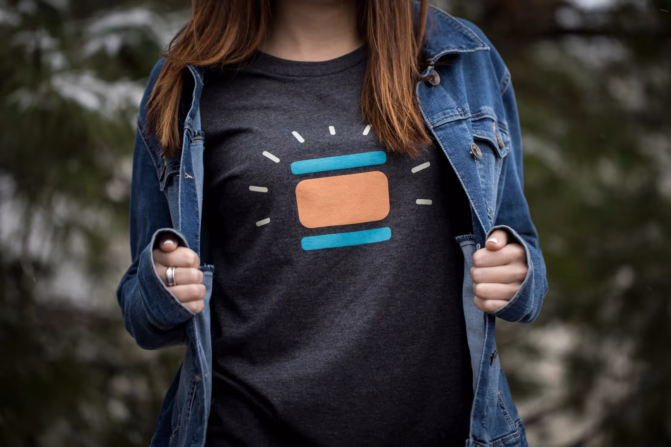 Woman wearing a t-shirt with the Leona's Ice cream Sandwich logo on it