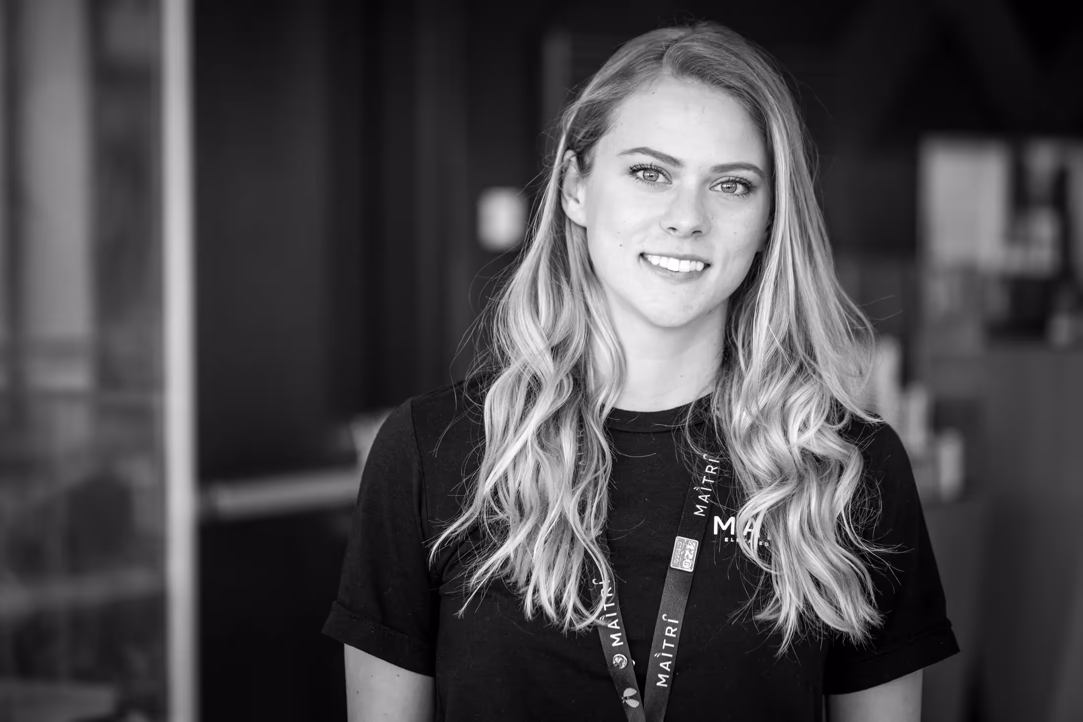 Portrait of a female Maitri employee in black and white
