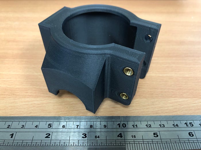 Carbon fiber PLA with heated thread inserts