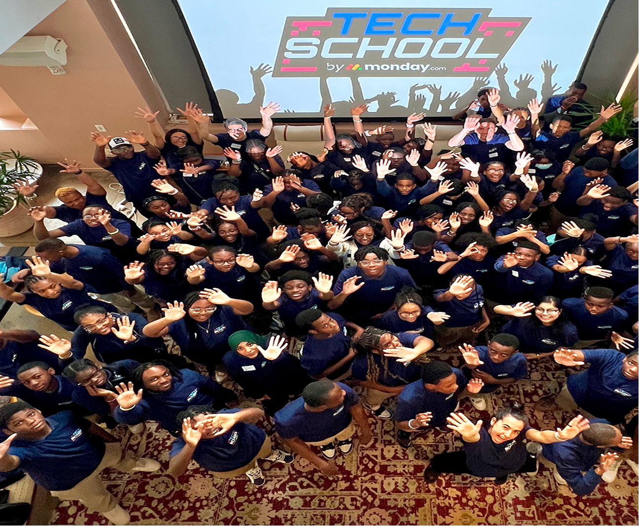 A picture of students looking at a three 3D printed object!