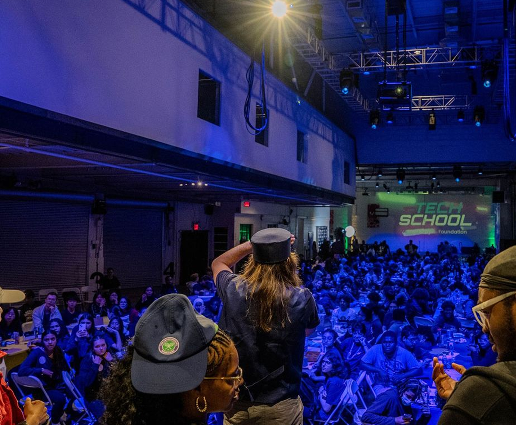 A picture of students looking at a three 3D printed object!