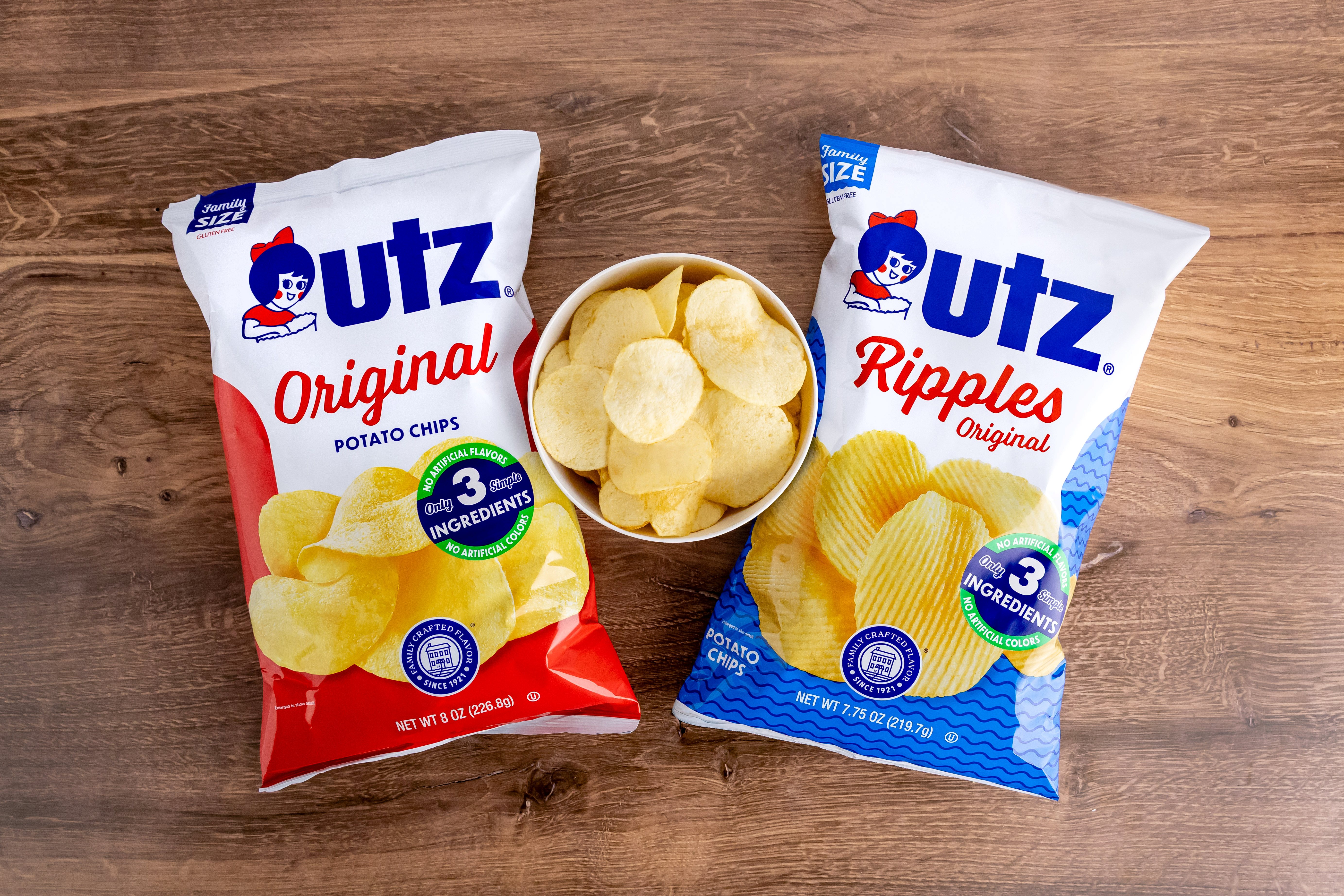 Assorted Utz chips in a row on the shelf