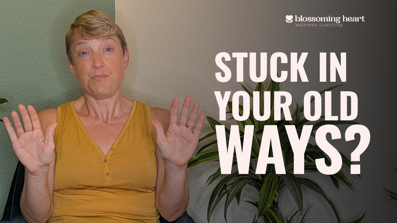 A woman with short hair and a calm expression raises her hands while text reads “Stuck in Your Old Ways?” on the right side of the image.