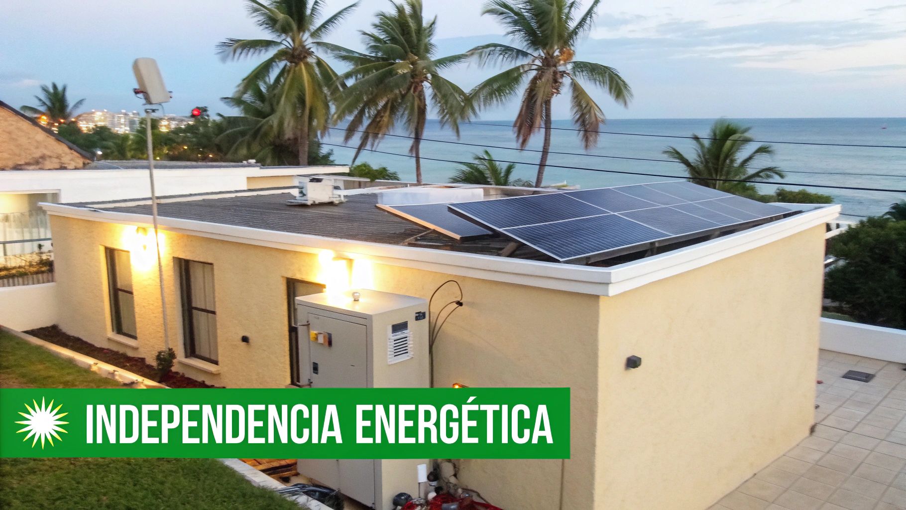Un edificio con paneles solares en el techo y el océano de fondo, promoviendo la independencia energética.