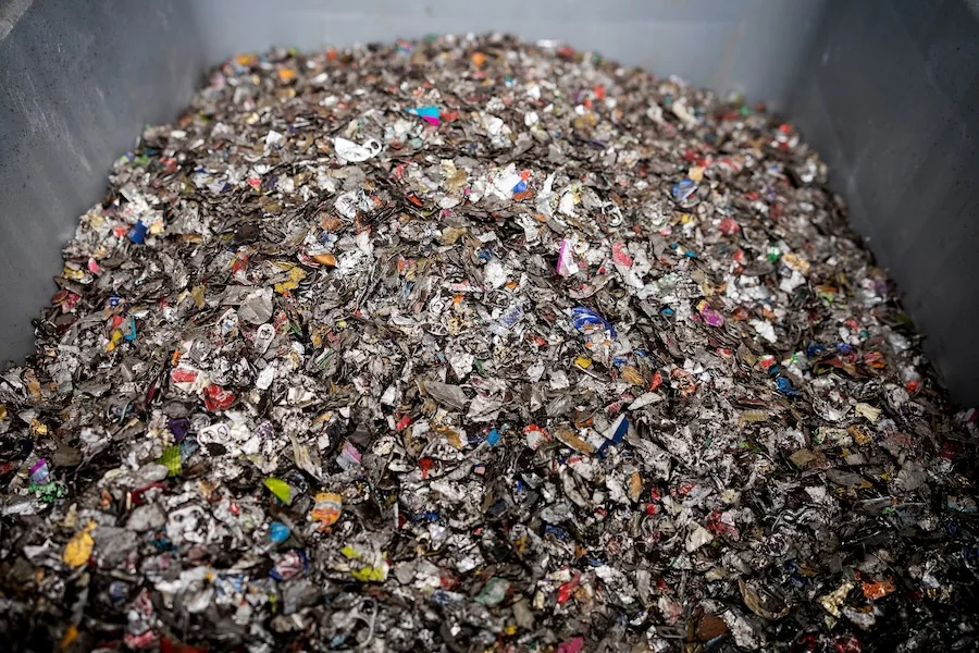 Afvalberg koffiecapsules om te recyclen