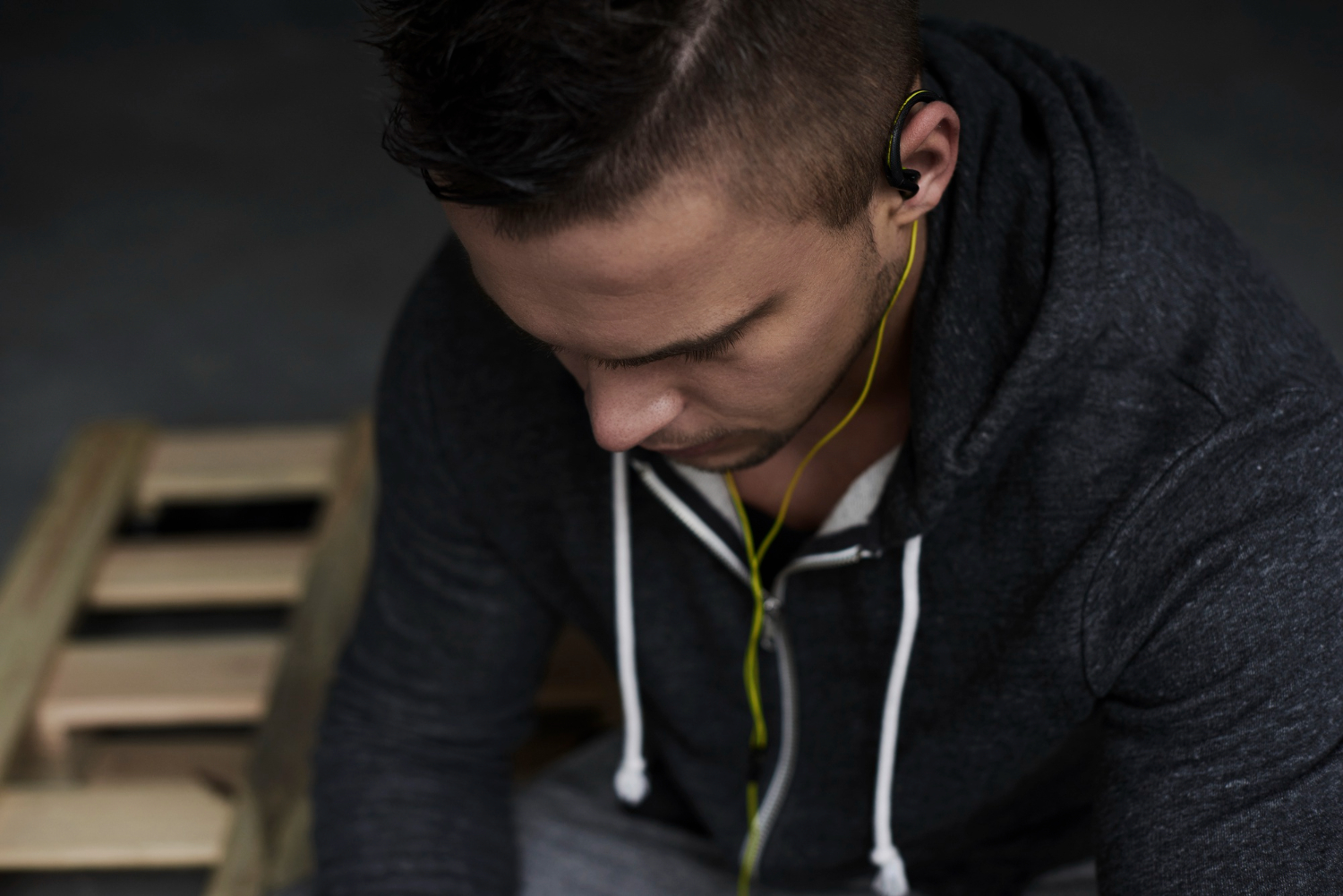 Person taking a quiet moment to reflect during addiction recovery, representing mindfulness and effective relapse prevention strategies beyond willpower.