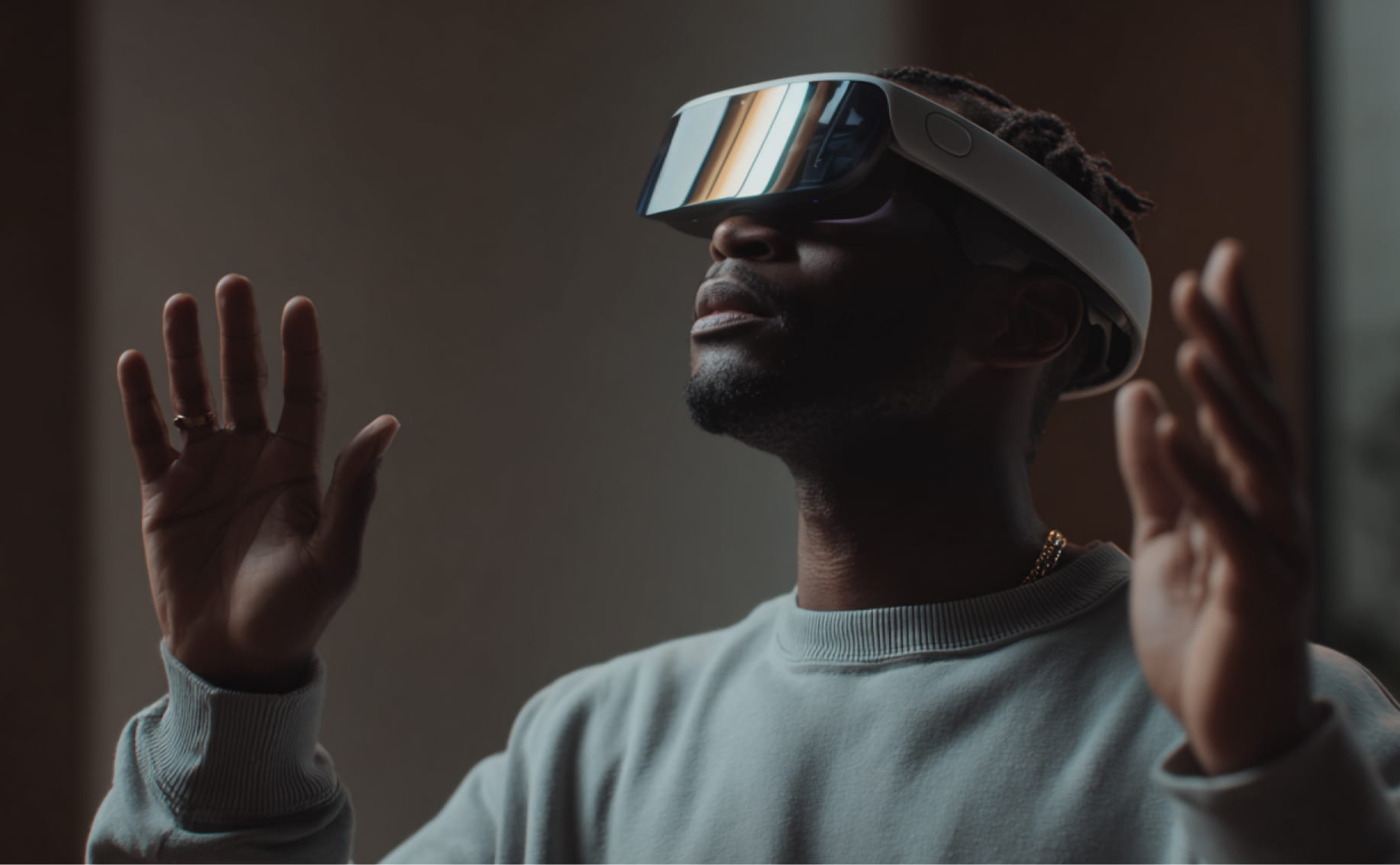 Man wearing Apple Vision Pro headset exploring augmented reality, illustrating the balance between immersive potential and practical use cases