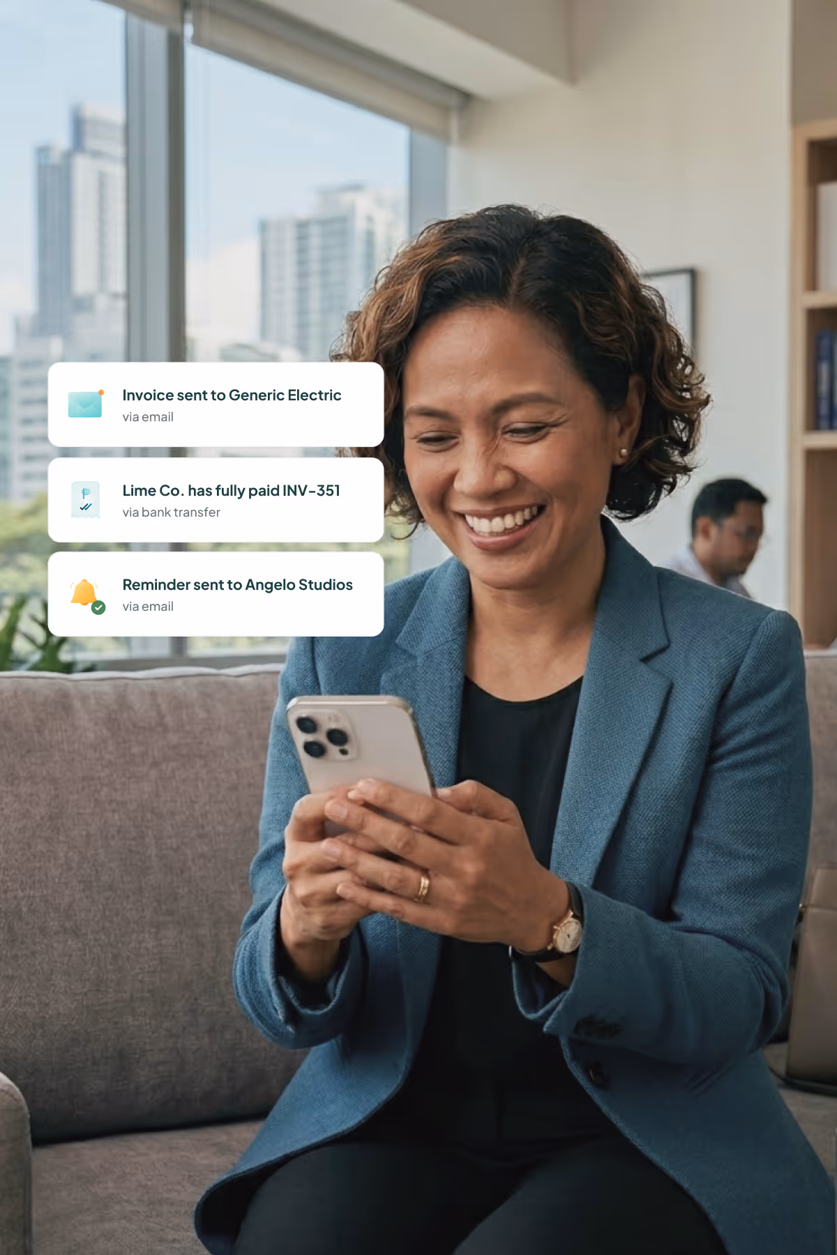 A women in business wear receiving notification from First Circle Invoice