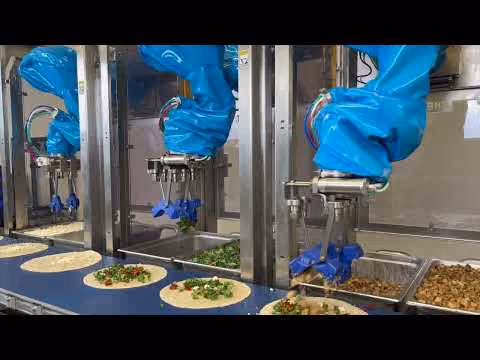 Watch Chef robots assemble a chicken wrap