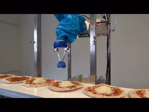 Chef robot assembling pizza