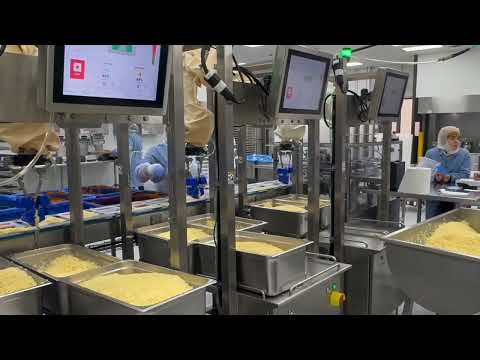 Eight Chef robots pick and place rice