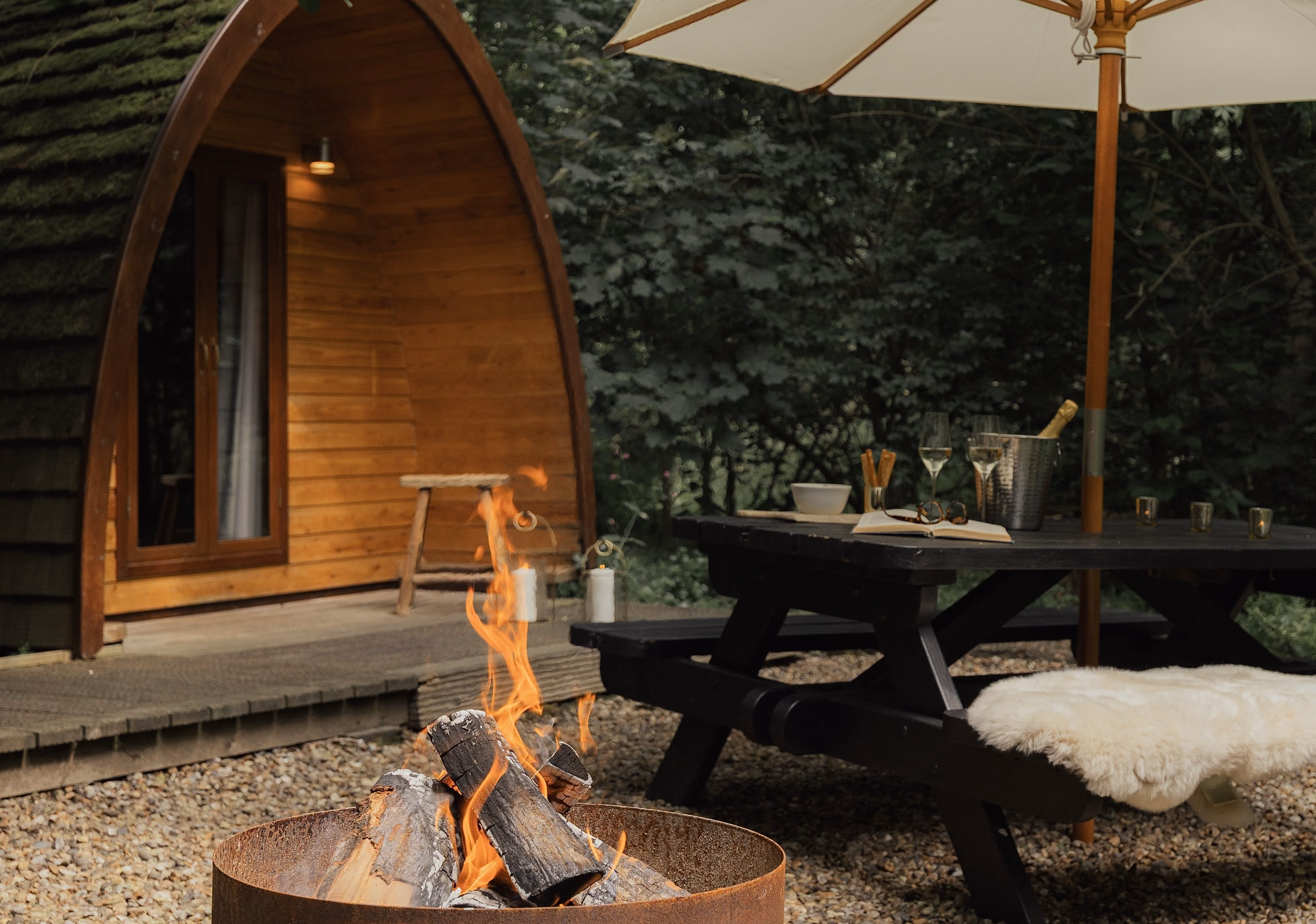 Camping Pod exterior with terrace decking and picnic area