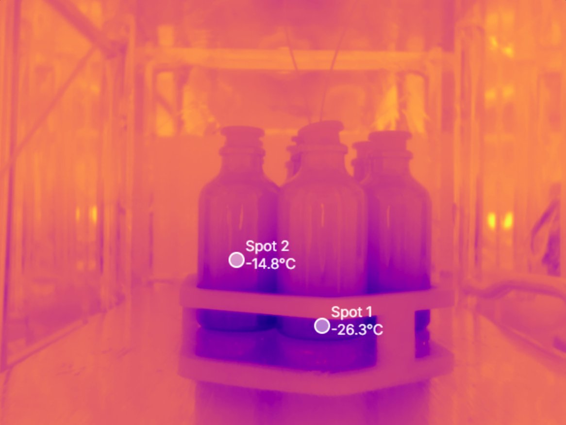 LyoVision thermal image of three bottles thawing, with spot temperature readings