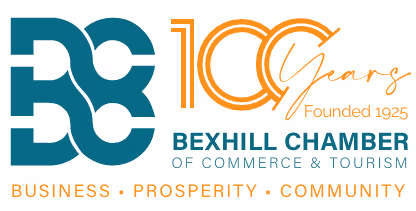 The image is a logo featuring stylized letters BB, "100 Years" text, and mentions Bexhill Chamber of Commerce and Tourism.