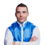 A man with his arms crossed wearing a blue and white jacket.