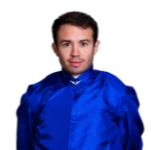 A man in a blue shirt and tie.