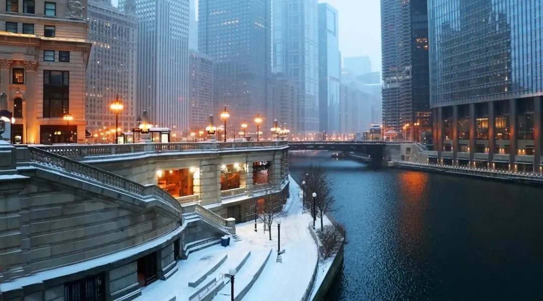 Illinois cityscape showing the Chicago River and downtown skyline in winter, highlighting the state’s major urban center.