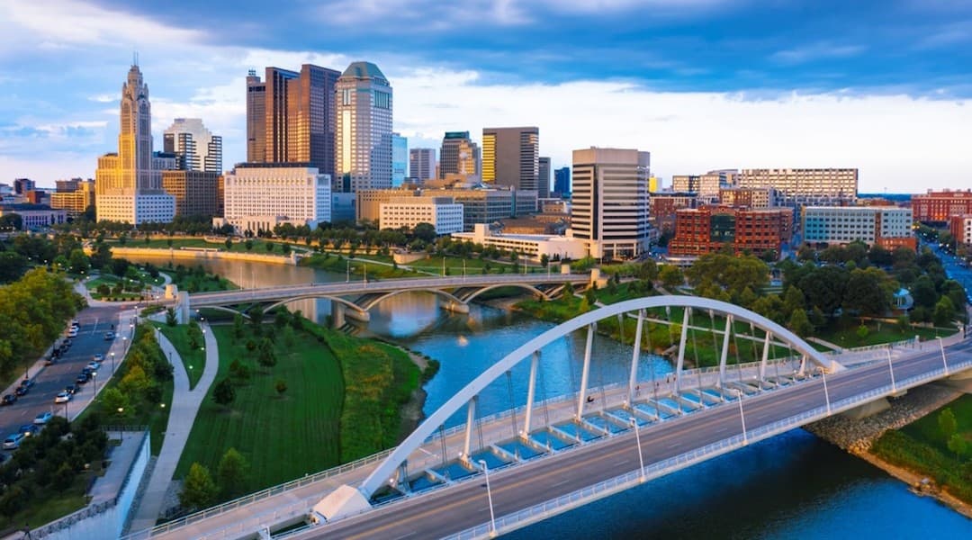 Ohio cityscape showing the Columbus skyline and Scioto River bridges, highlighting the state’s modern urban landscape.