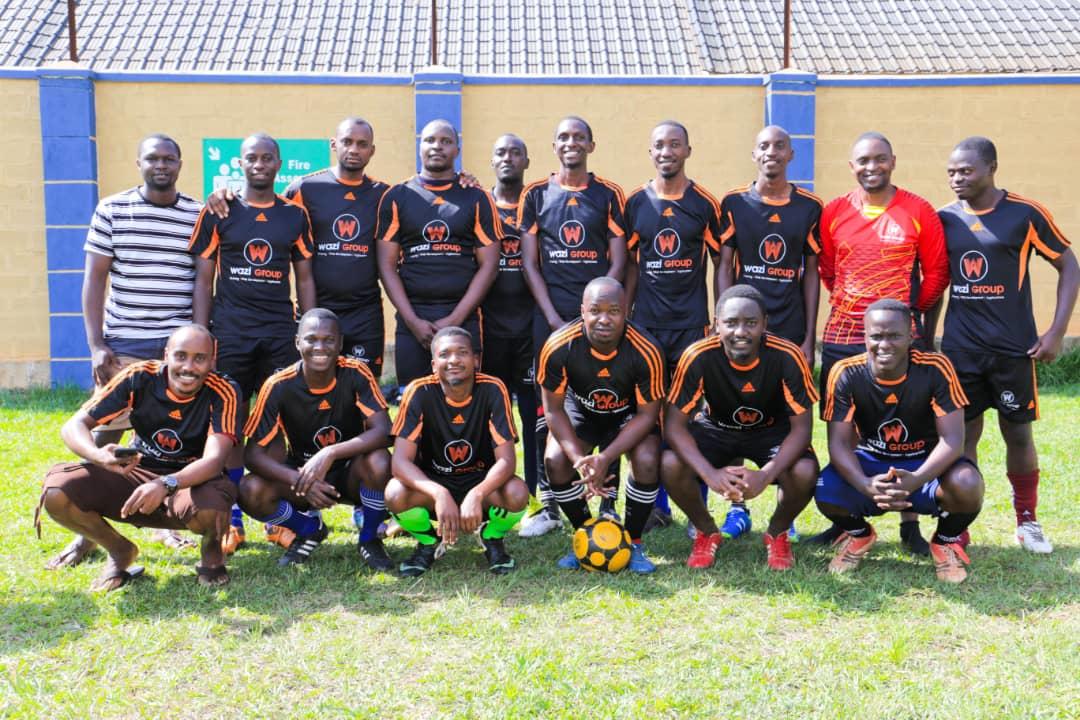 a group of football players posing for a picture