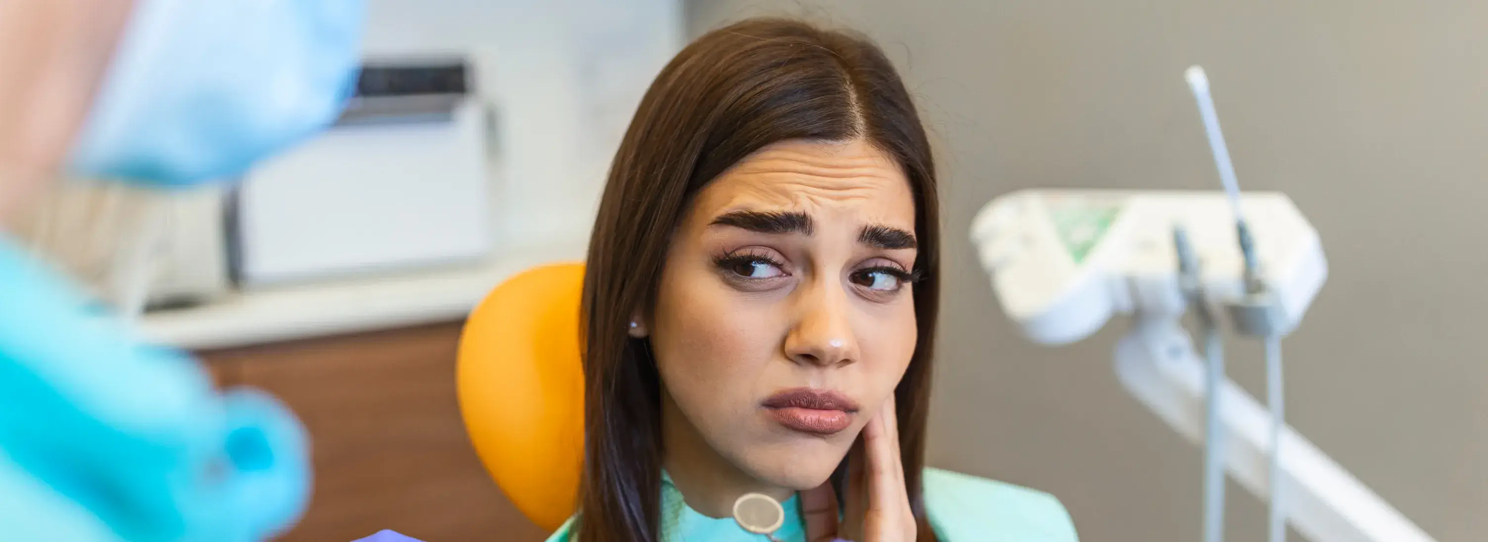 A woman with a concerned look on her face.