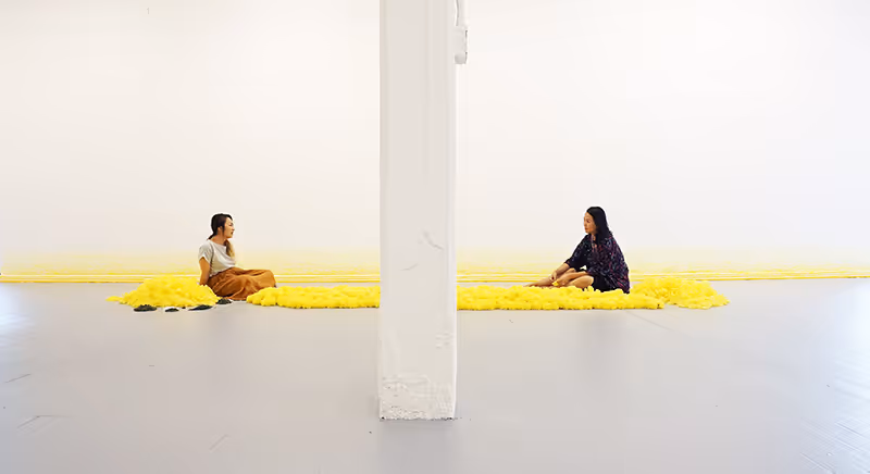 Loving Deeply I, 2018 / East Hall Gallery, Pratt Institute, Brooklyn, NY / 7 Days Performance Yellow Silk Flowers, 300” x 72” (Gallery View)