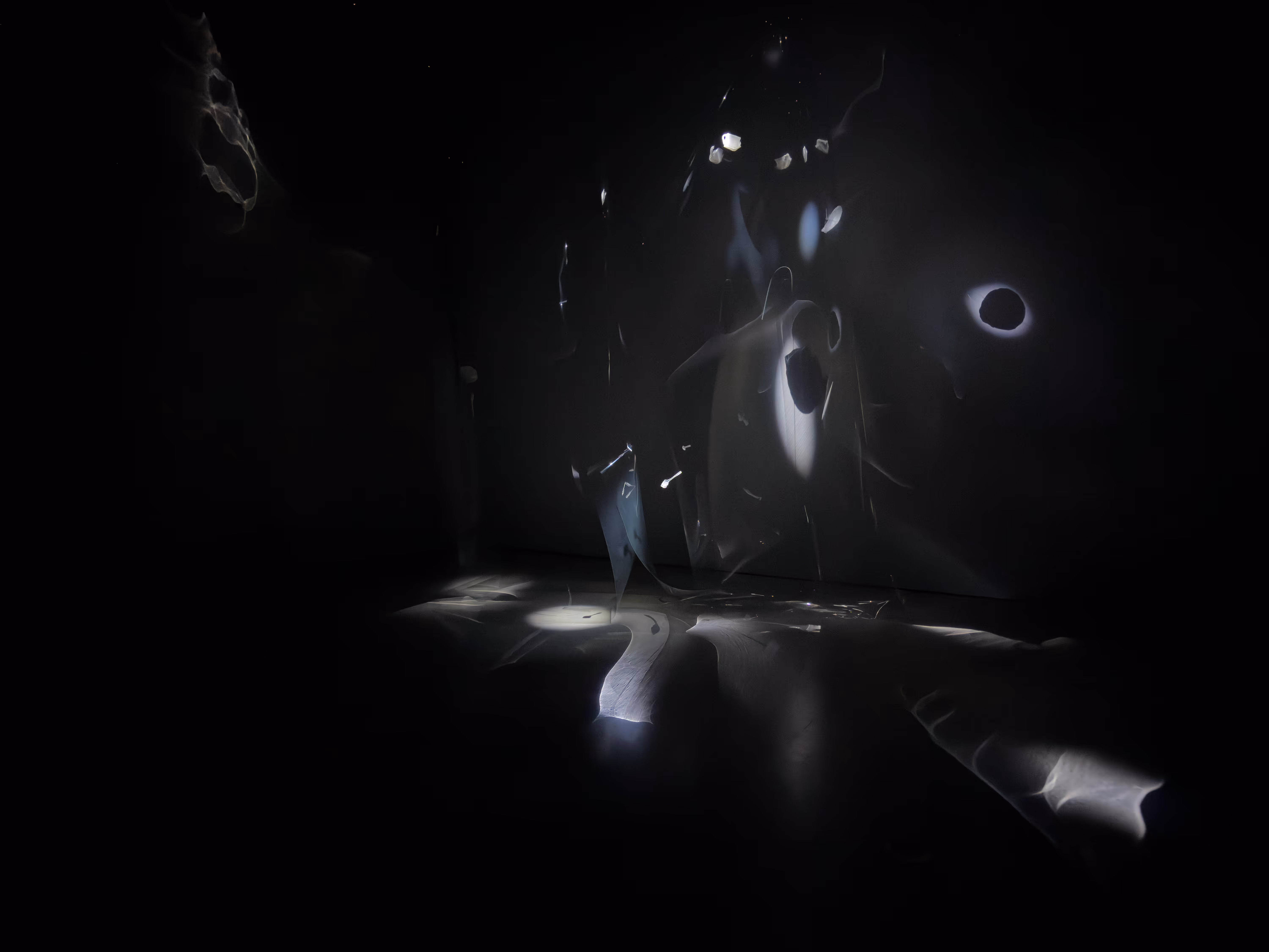 La Loza. 2024.Site-specific installation.(light, polyester and napkins) 118 x 118 x 157 inches aprox